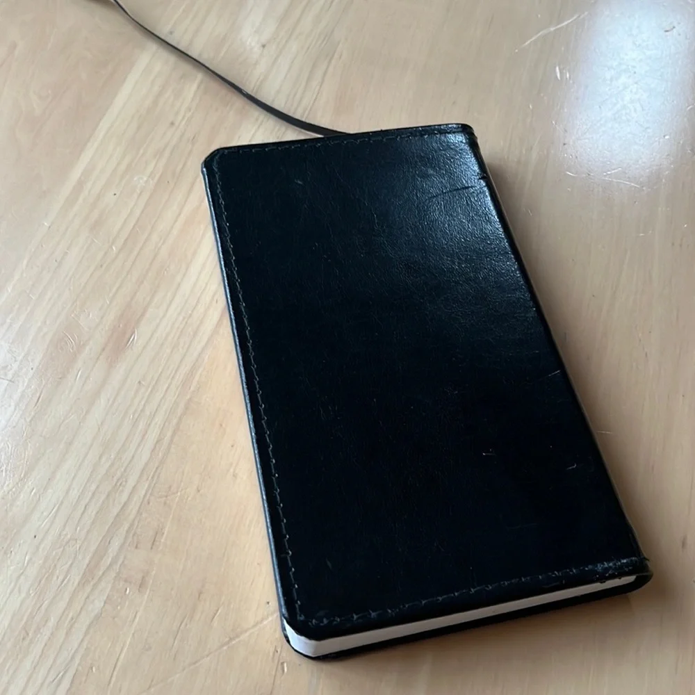 Black leather hard cover notebook for writing or drawing